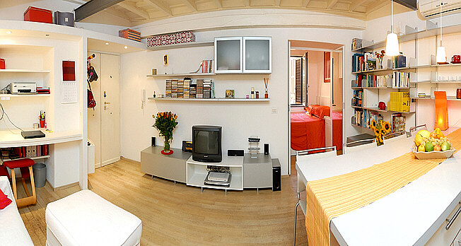 Living room seen from the bathroom and storage corridor